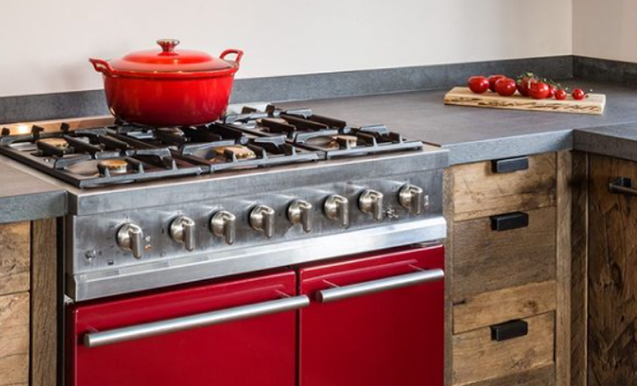 red lacanche range with red dutch oven